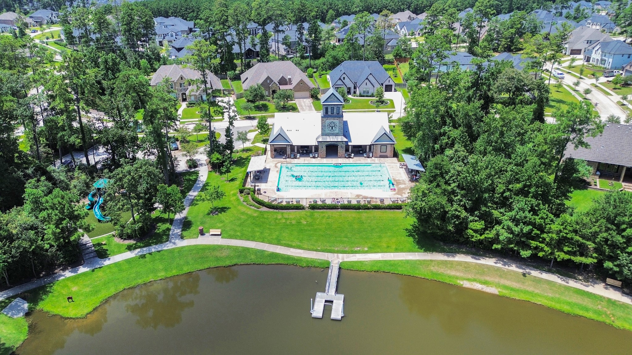 633 Ashbrook Ridge Lane Pinehurst, TX 77362 - Photo 34 of 35 a view of a chair and table in the garden