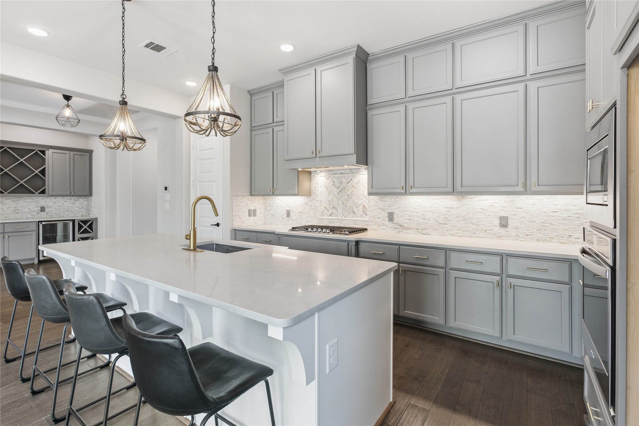 633 Ashbrook Ridge Lane Pinehurst, TX 77362 - Photo 8 of 35 a kitchen with a sink cabinets and window