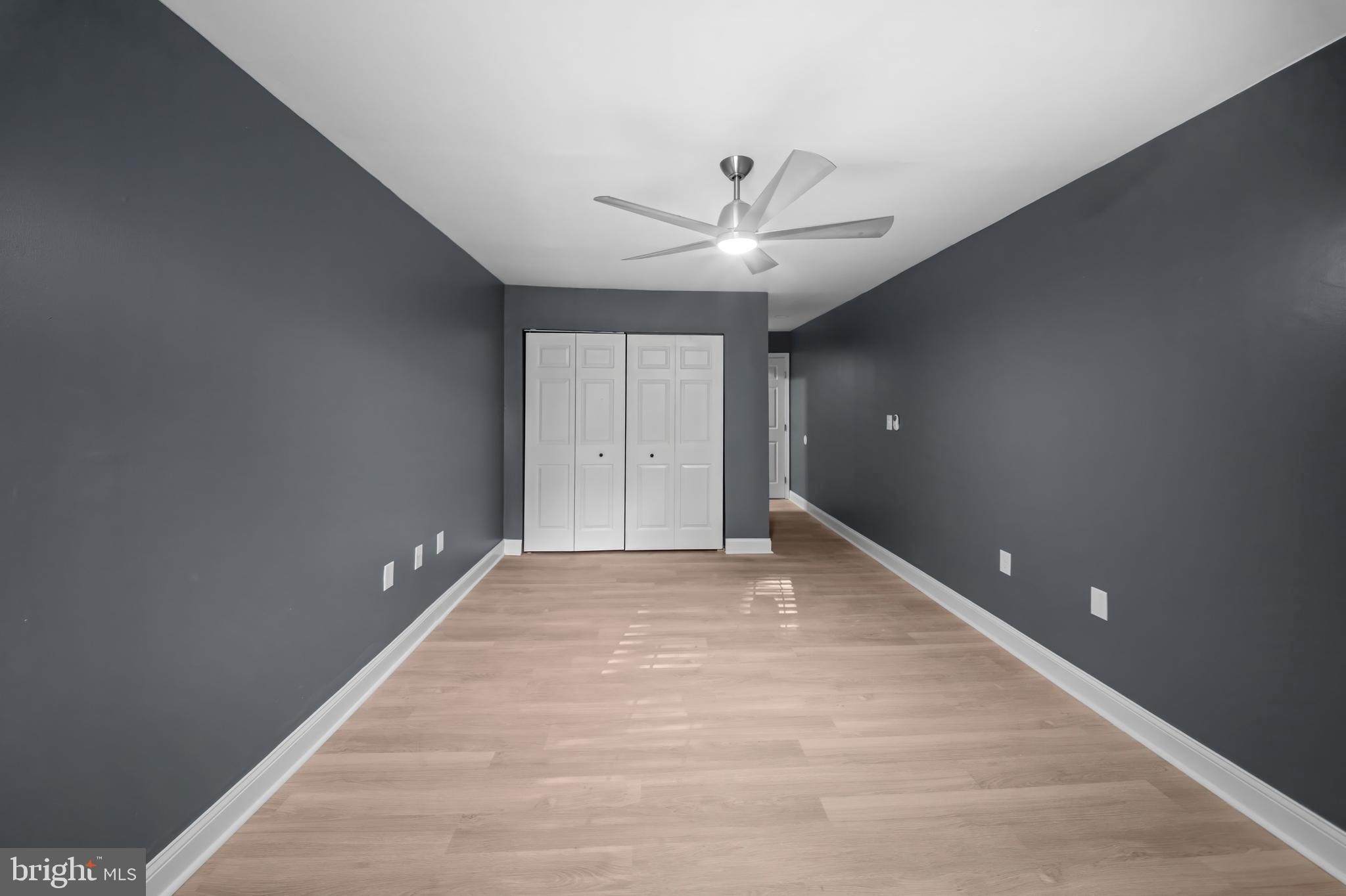2 Mountbatten Court Baltimore, MD 21207 - Photo 8 of 13 a view of an empty room with a ceiling fan