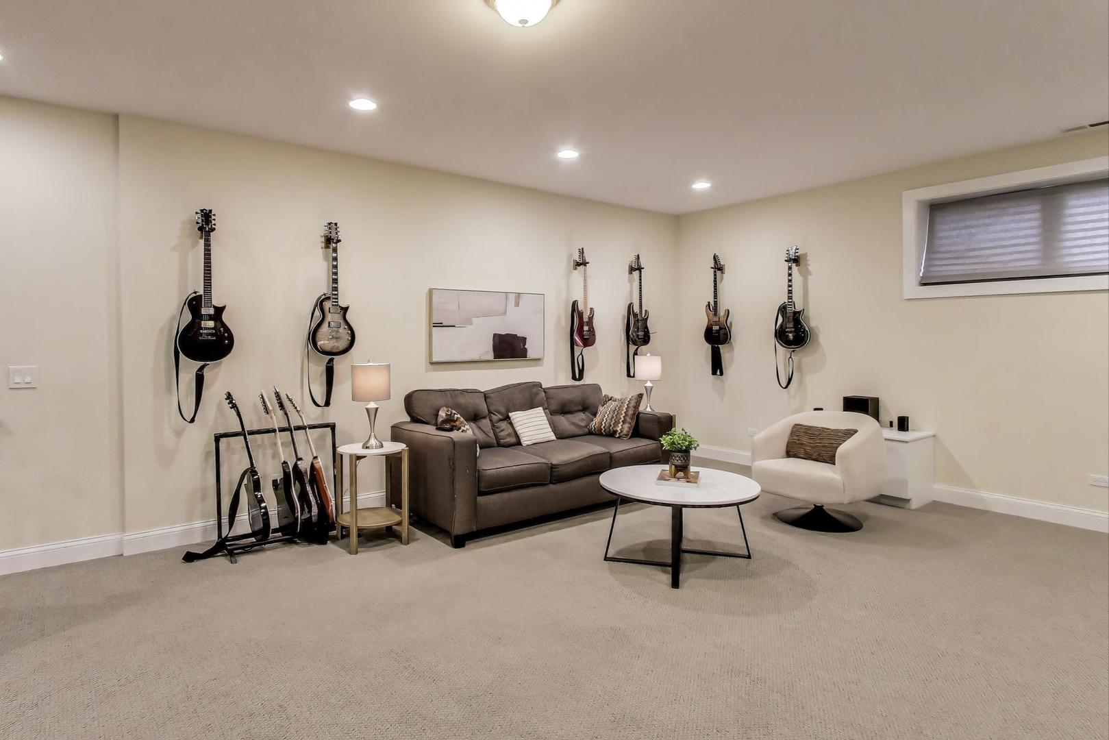 1045 West 34th Place Chicago, IL 60608 - Photo 24 of 35 a living room with furniture and gym equipment