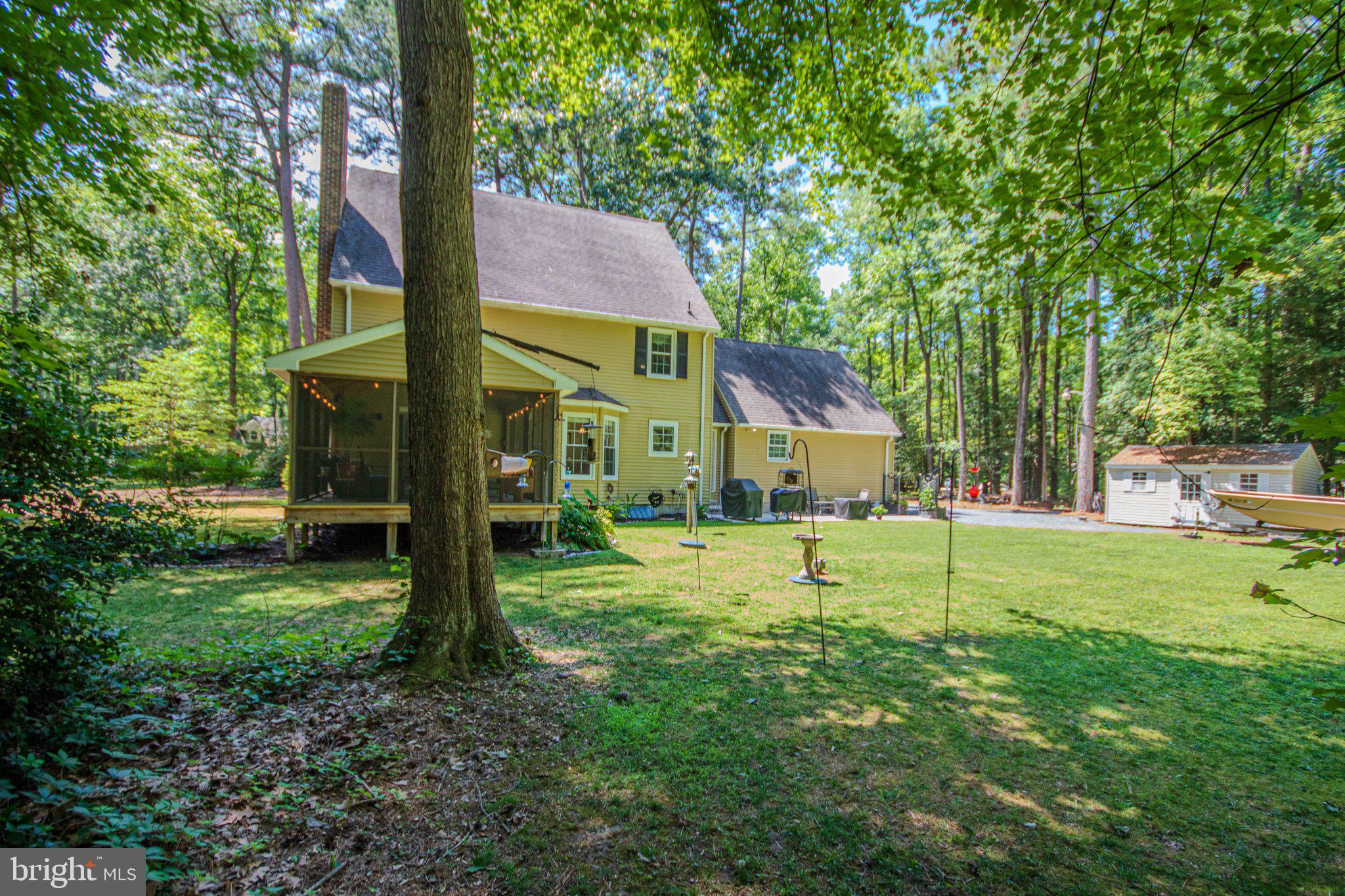 7301 Topaz Court Hebron, MD 21830 - Photo 41 of 47 Charming yellow home in serene woods.