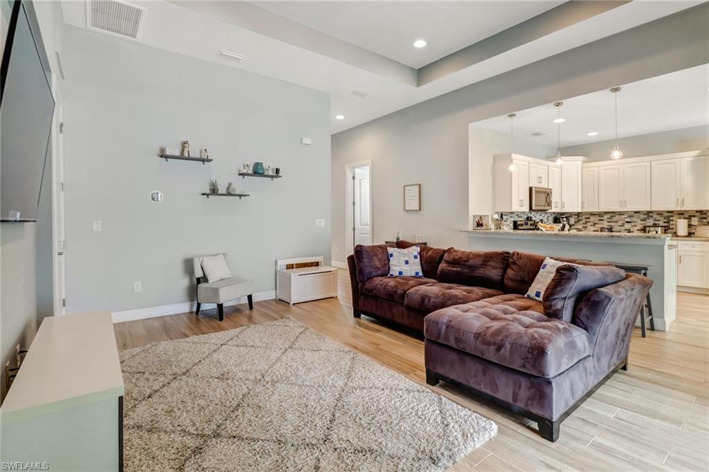 8476 Grove Road Fort Myers, FL 33967 - Photo 12 of 25 a living room with furniture and a couch