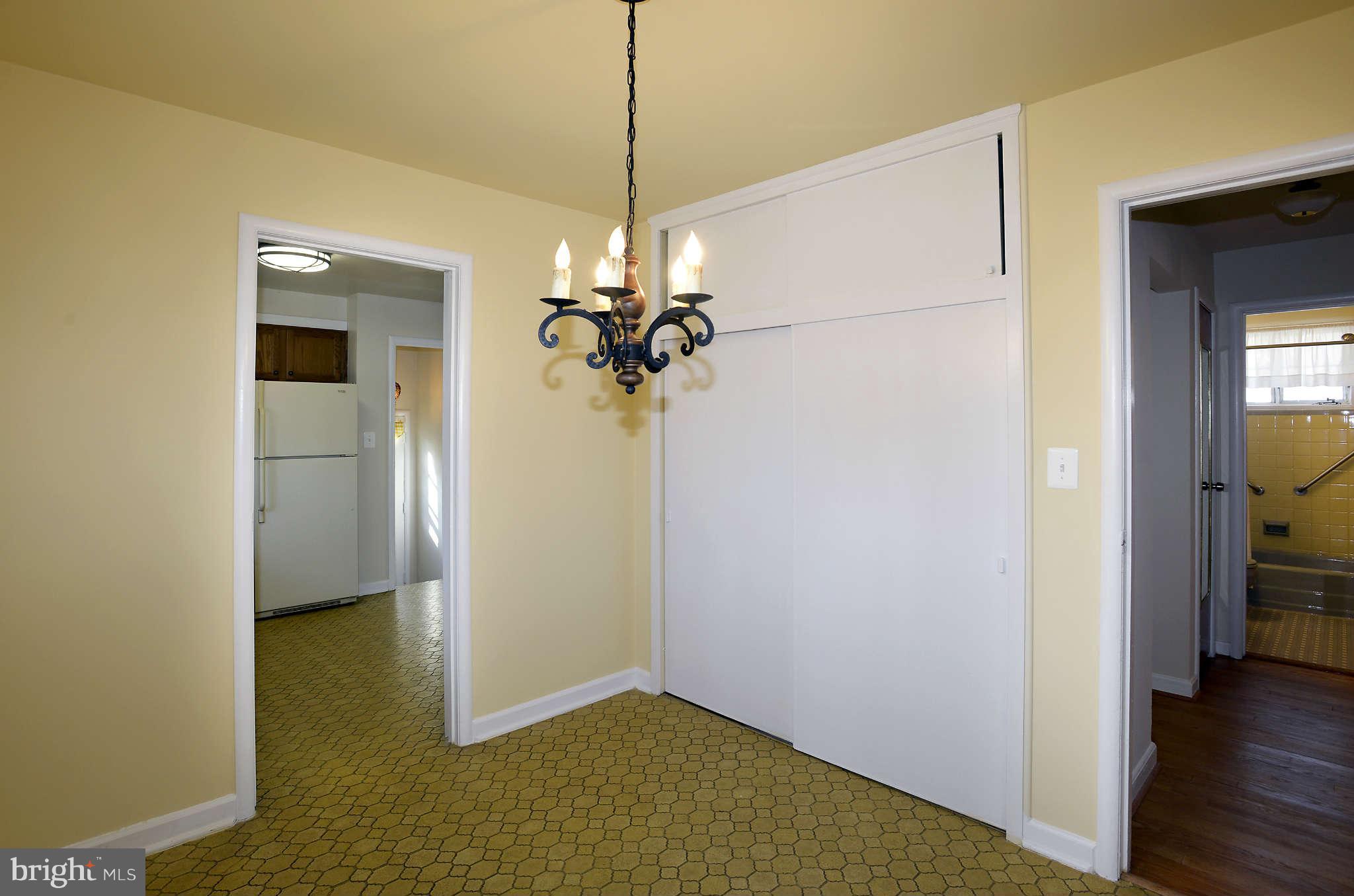 3913 Isbell Street Silver Spring, MD 20906 - Photo 9 of 23 a view of a livingroom with a chandelier