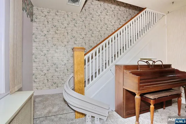 a view of entryway with a front door