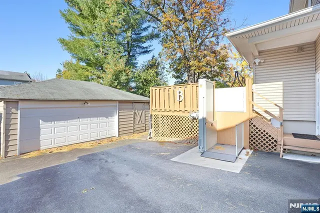 a view of backyard and deck