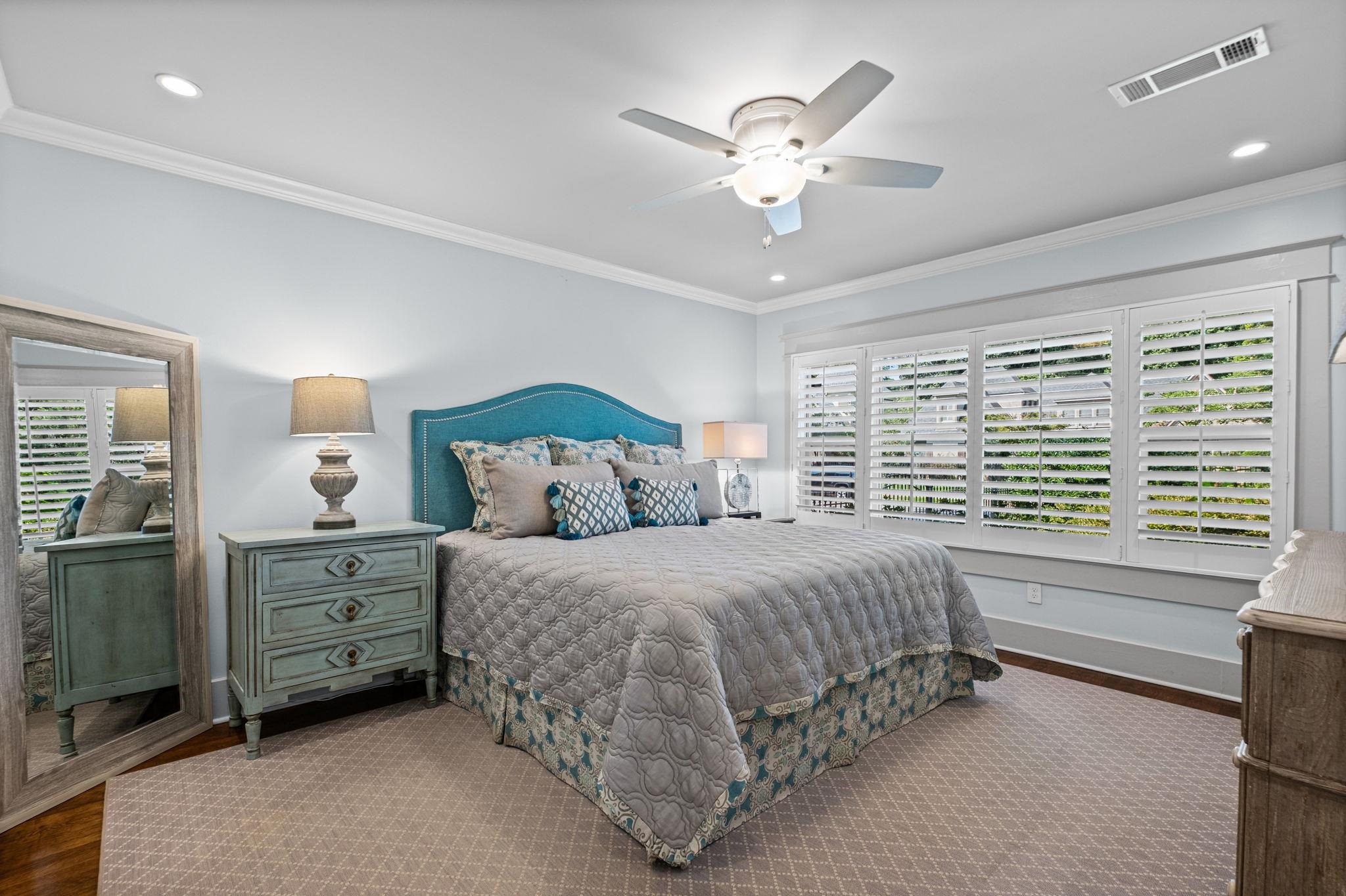 5079 Walnut Grove Road Memphis, TN 38117 - Photo 22 of 40 Crown molding, recessed lighting, ceiling fan, wide window trim, and plantation shutters