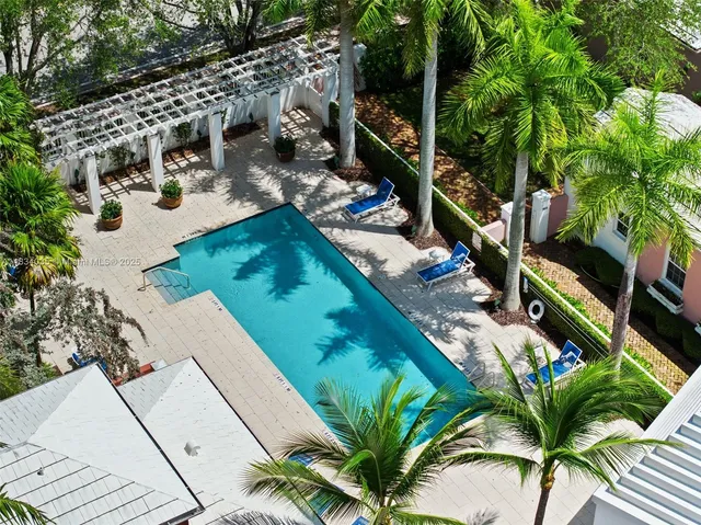 an aerial view of house with yard