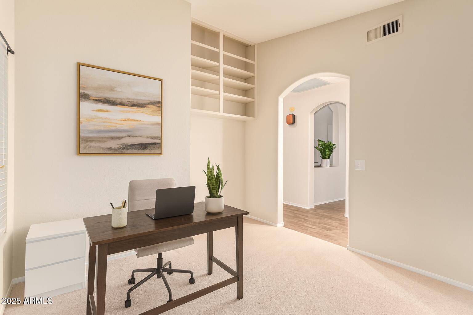 15596 West Flower Court Goodyear, AZ 85395 - Photo 24 of 35 a view of a workspace with furniture