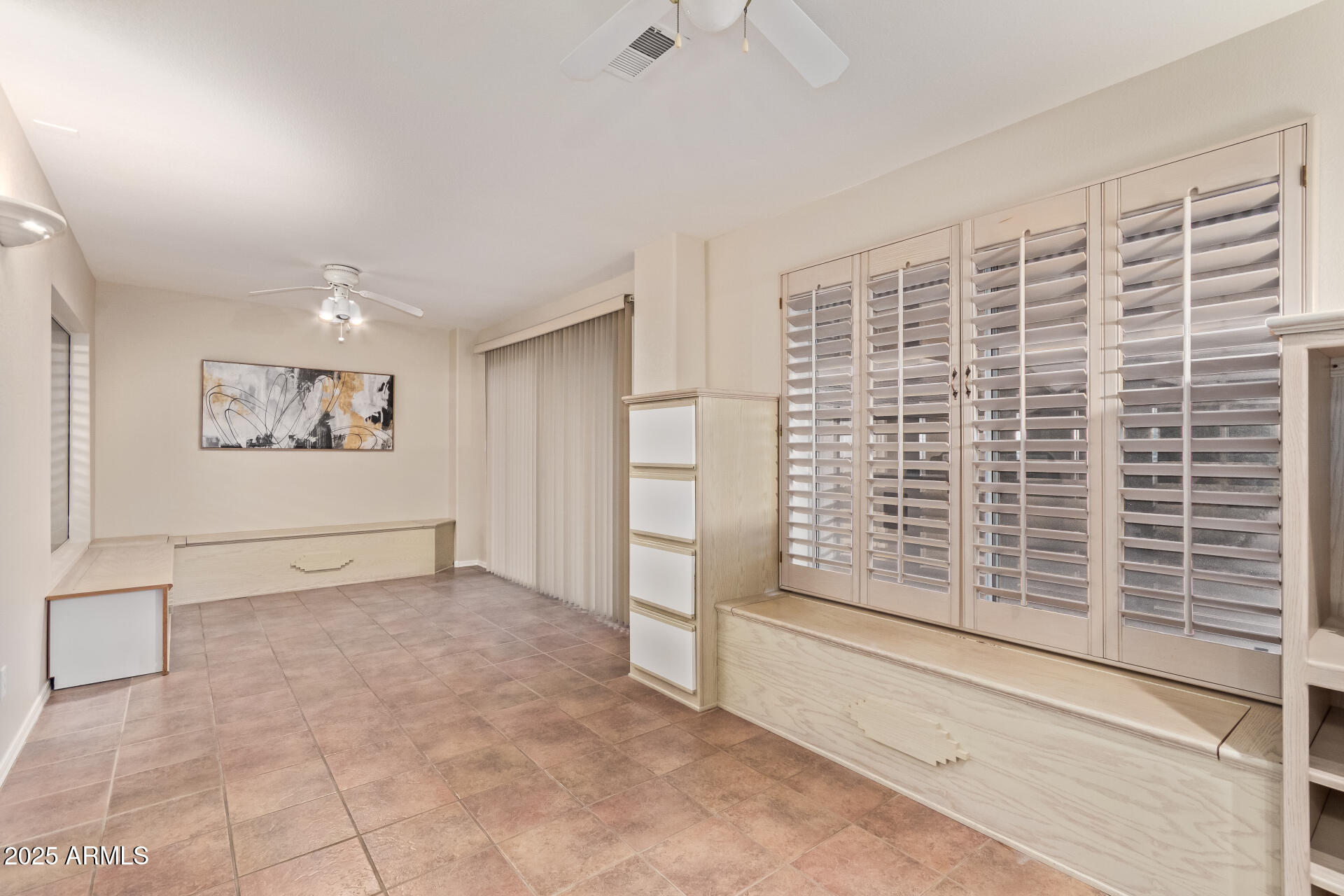 15596 West Flower Court Goodyear, AZ 85395 - Photo 31 of 35 a view of livingroom with hardwood