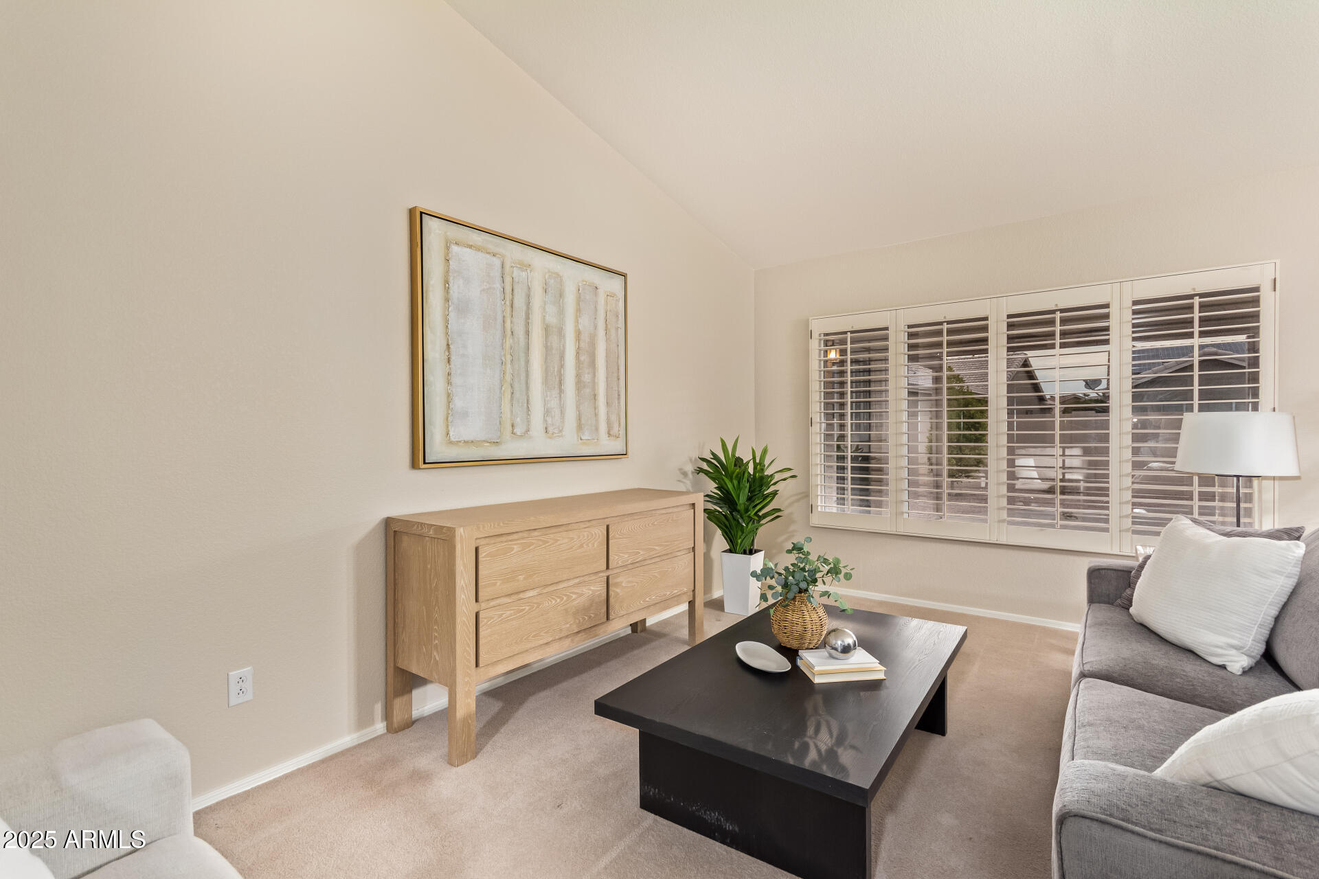 15596 West Flower Court Goodyear, AZ 85395 - Photo 7 of 35 a living room with furniture and window