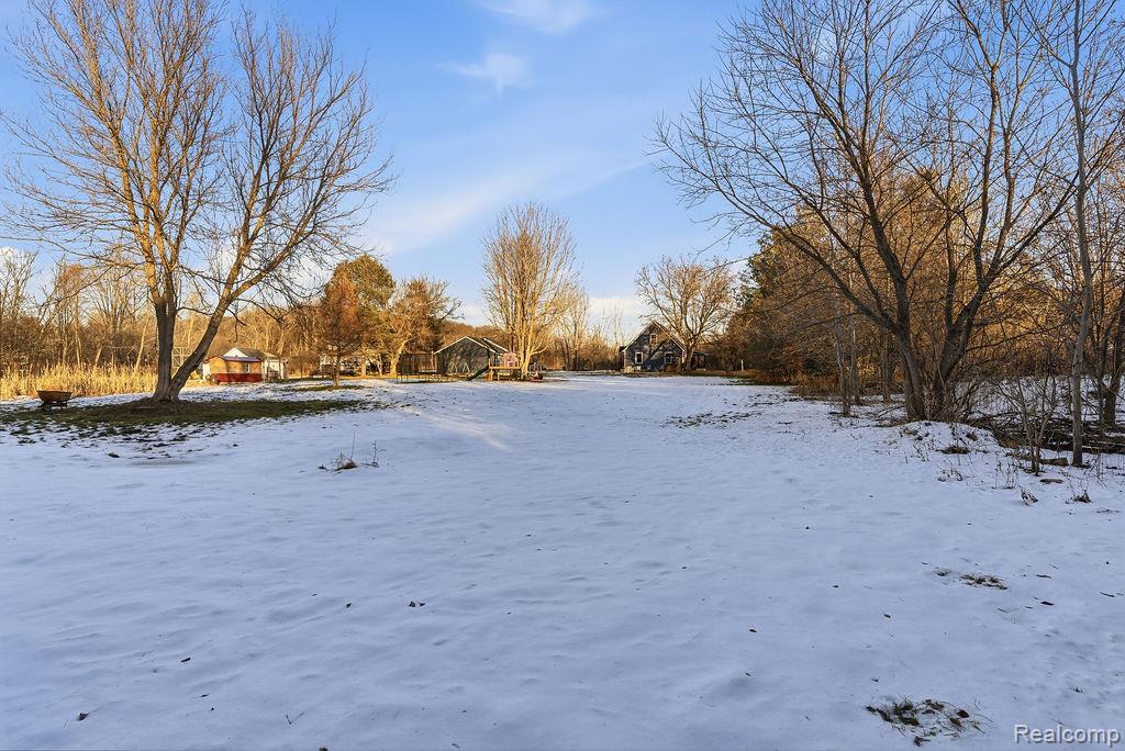 5216 South State Road Goodrich, MI 48438 - Photo 36 of 52 View of yard layered in snow