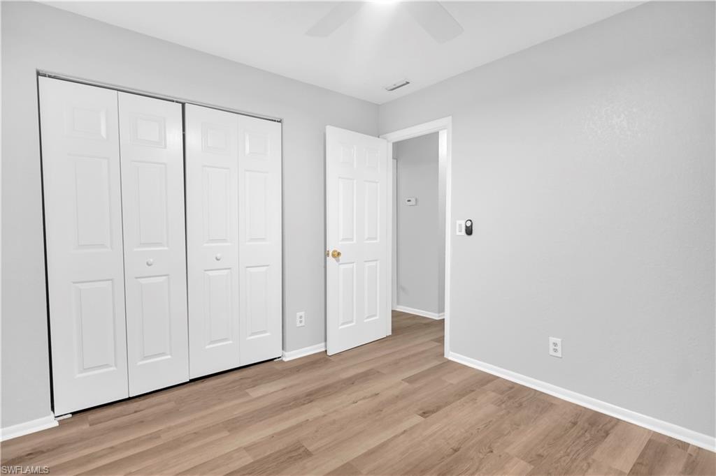 4627 Bayshore Drive, Unit I8 Naples, FL 34112 - Photo 18 of 20 Guest Bedroom