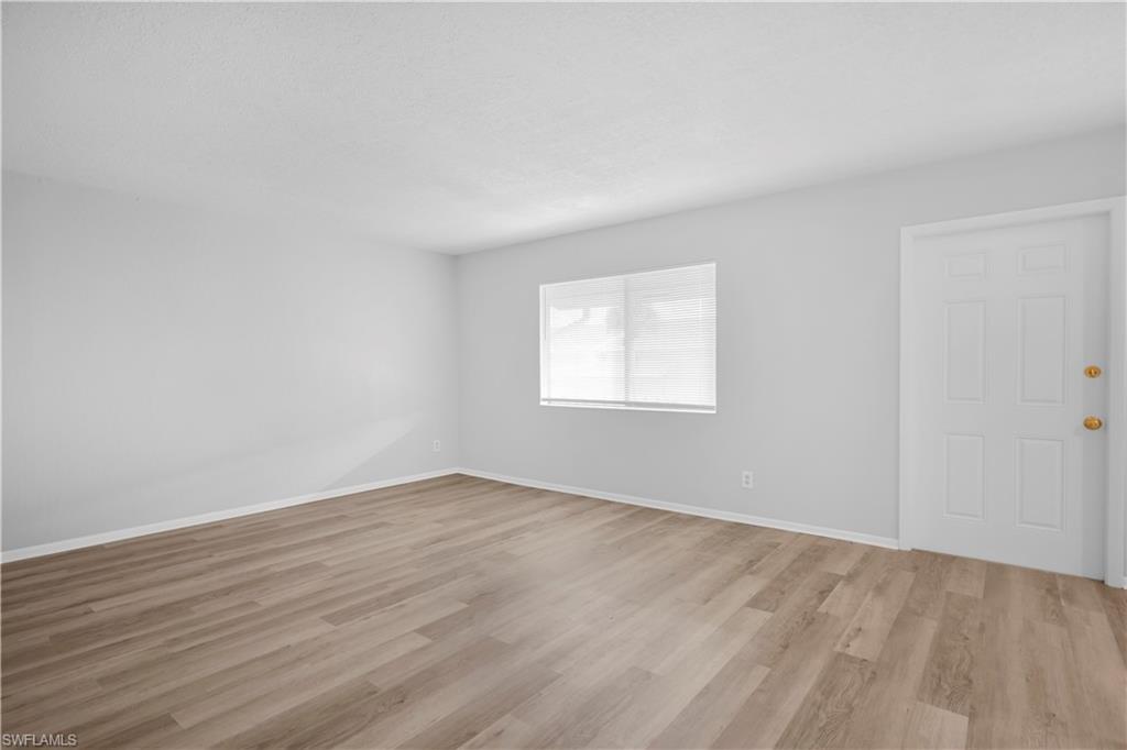 4627 Bayshore Drive, Unit I8 Naples, FL 34112 - Photo 3 of 20 Living Room