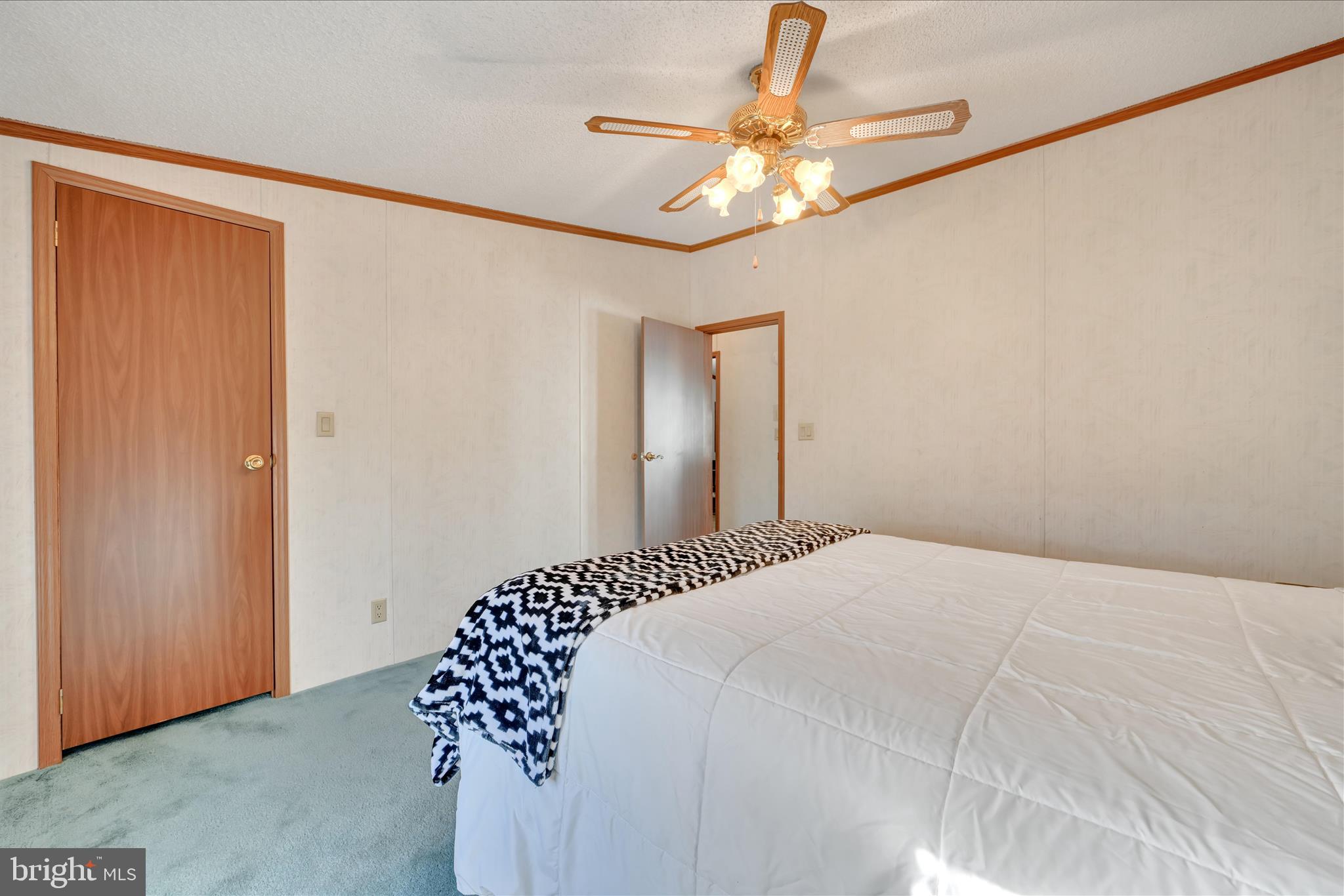 362 West Cedar Street Palmyra, PA 17078 - Photo 23 of 29 a bedroom with a large bed and a chandelier