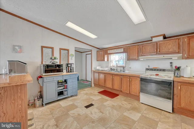 a view of living room with furniture and cabinets
