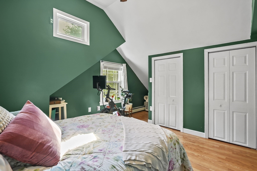 9 Oregon Road Southborough, MA 01772 - Photo 12 of 27 a bedroom with a bed and a painting on the wall