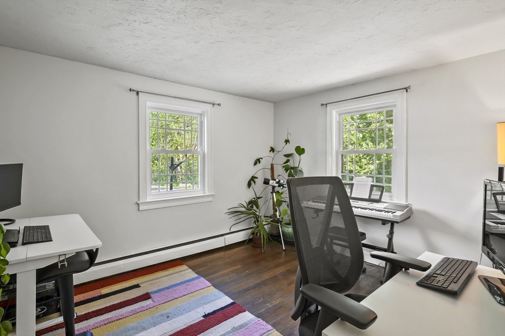9 Oregon Road Southborough, MA 01772 - Photo 15 of 27 a view of a workspace with furniture and a window