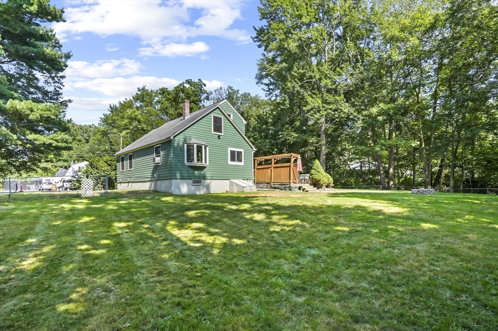 9 Oregon Road Southborough, MA 01772 - Photo 23 of 27 a front view of a house with a yard