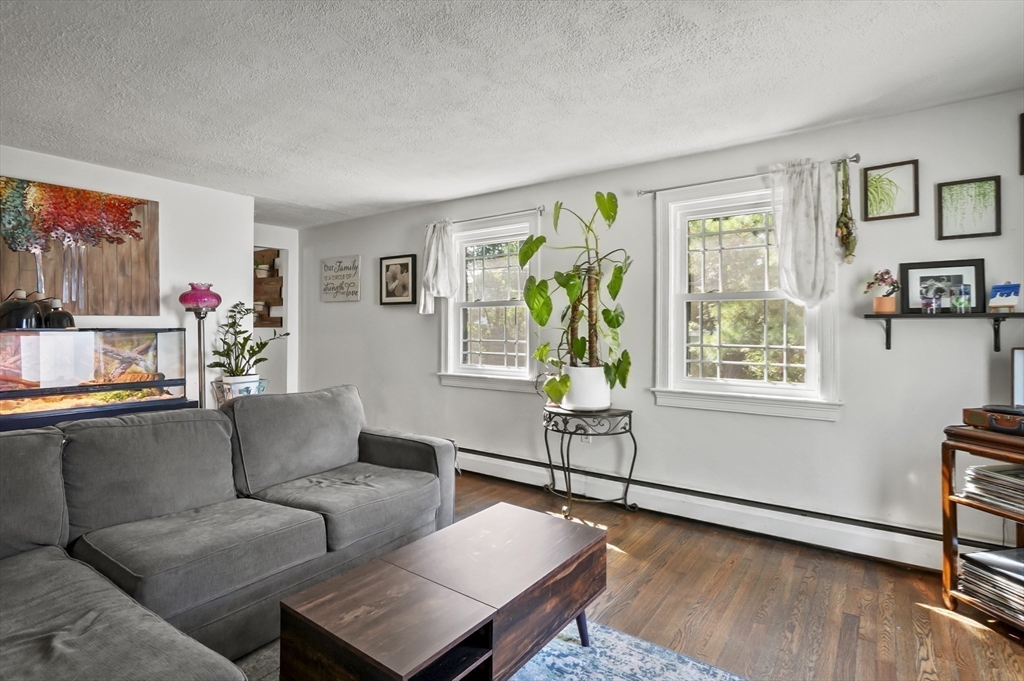 9 Oregon Road Southborough, MA 01772 - Photo 3 of 27 a living room with furniture and a window