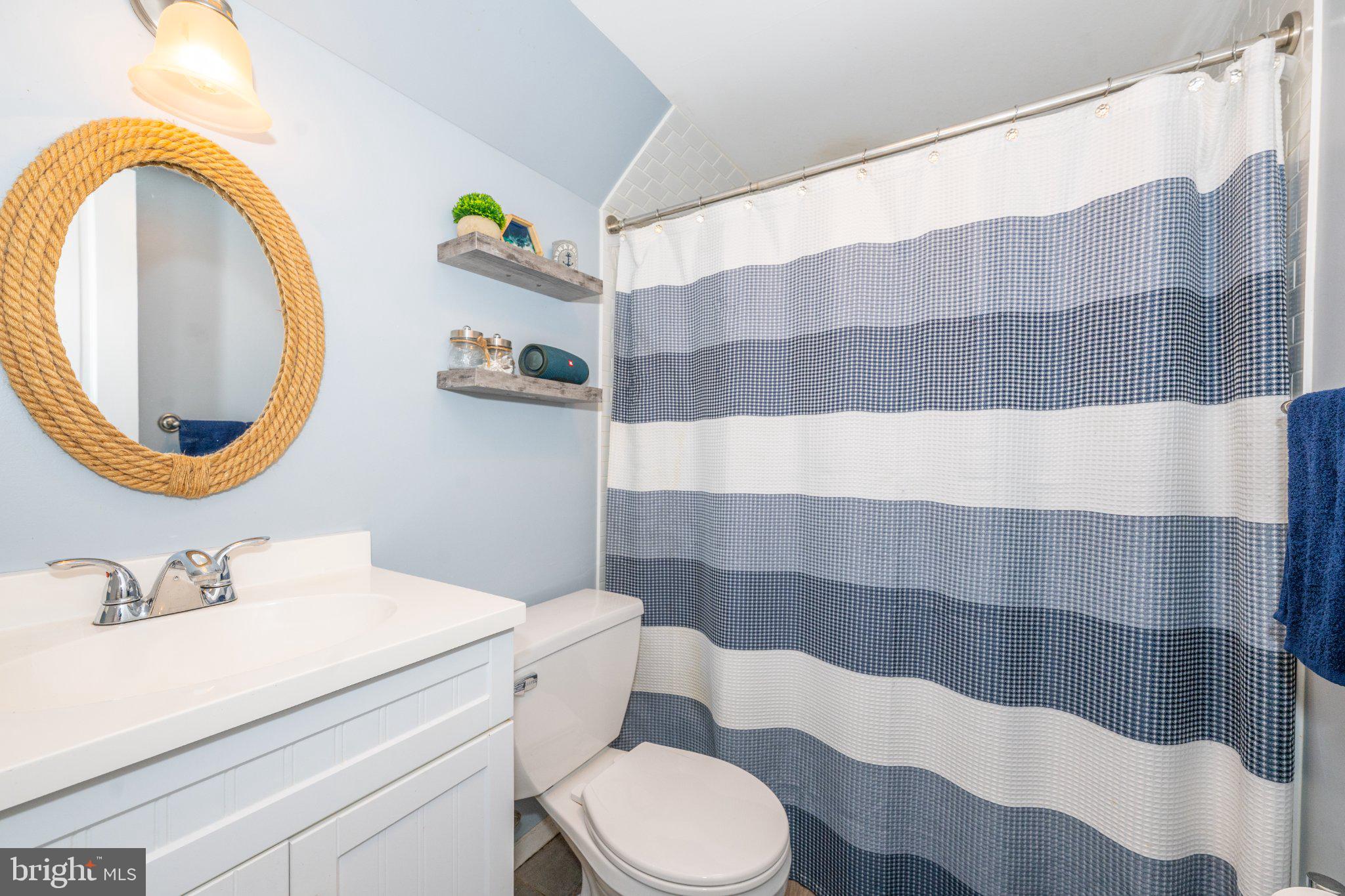 1 W Road Boonton, NJ 07005 - Photo 36 of 45 Coastal charm in a serene bathroom.