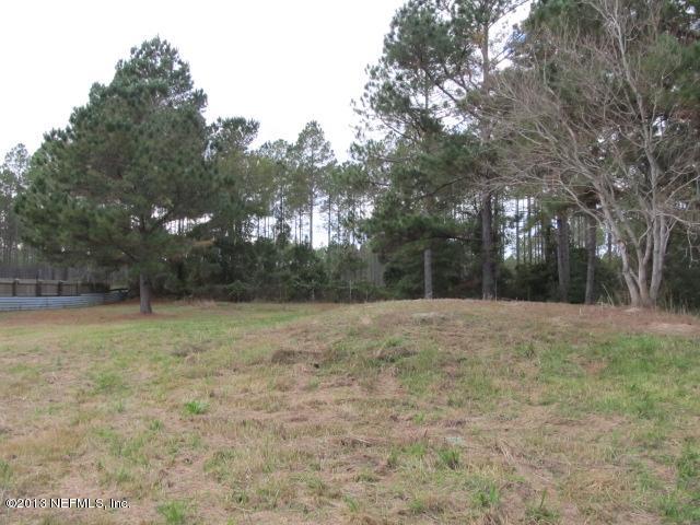 6359 Memory Lane Jacksonville, FL 32234 - Photo 11 of 11 a view of outdoor space with trees