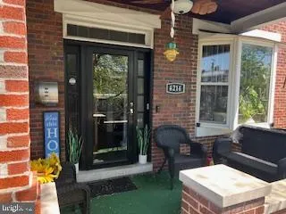 a backyard of a house with seating space