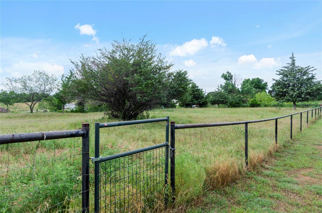 6093 Farm To Market Road 730 North Decatur, TX 76234 - Photo 25 of 28 a view of outdoor space with green field and trees