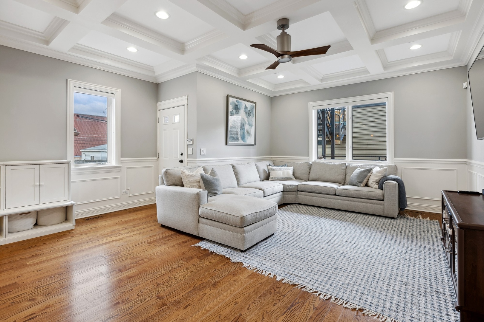 1520 West Diversey Parkway, Unit 1 Chicago, IL 60614 - Photo 12 of 31 a living room with furniture and a large window