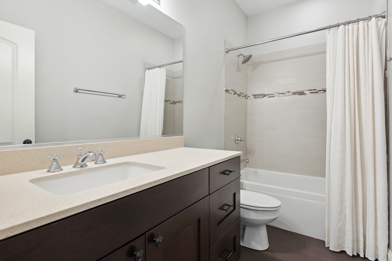 1520 West Diversey Parkway, Unit 1 Chicago, IL 60614 - Photo 15 of 31 a bathroom with a sink a toilet and shower