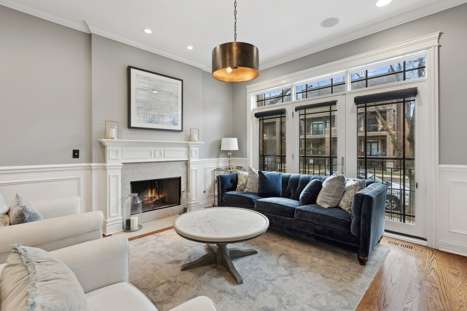 1520 West Diversey Parkway, Unit 1 Chicago, IL 60614 - Photo 2 of 31 a living room with furniture a window and a fireplace