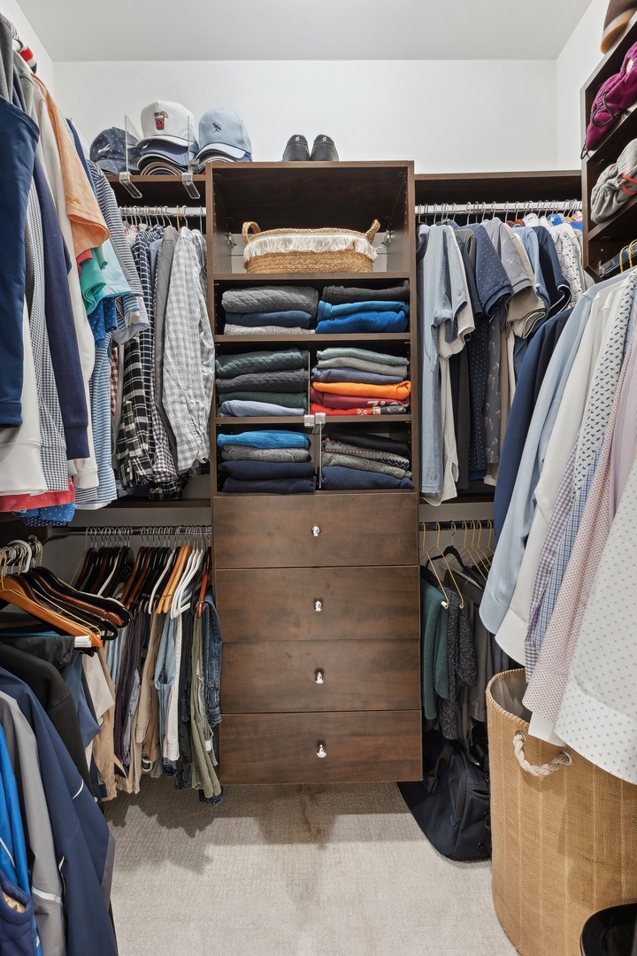 1520 West Diversey Parkway, Unit 1 Chicago, IL 60614 - Photo 22 of 31 a view of walk in closet with clothes and shoes