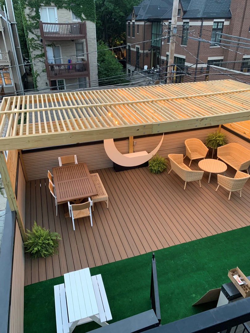 1520 West Diversey Parkway, Unit 1 Chicago, IL 60614 - Photo 26 of 31 a view of outdoor space yard deck patio and outdoor kitchen