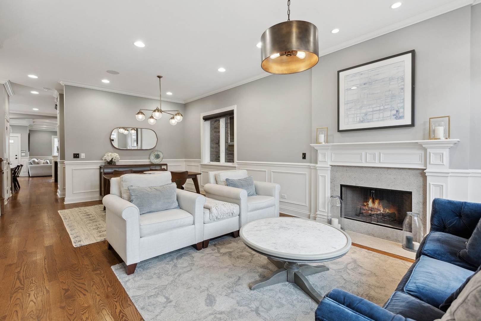 1520 West Diversey Parkway, Unit 1 Chicago, IL 60614 - Photo 3 of 31 a living room with furniture and a fireplace