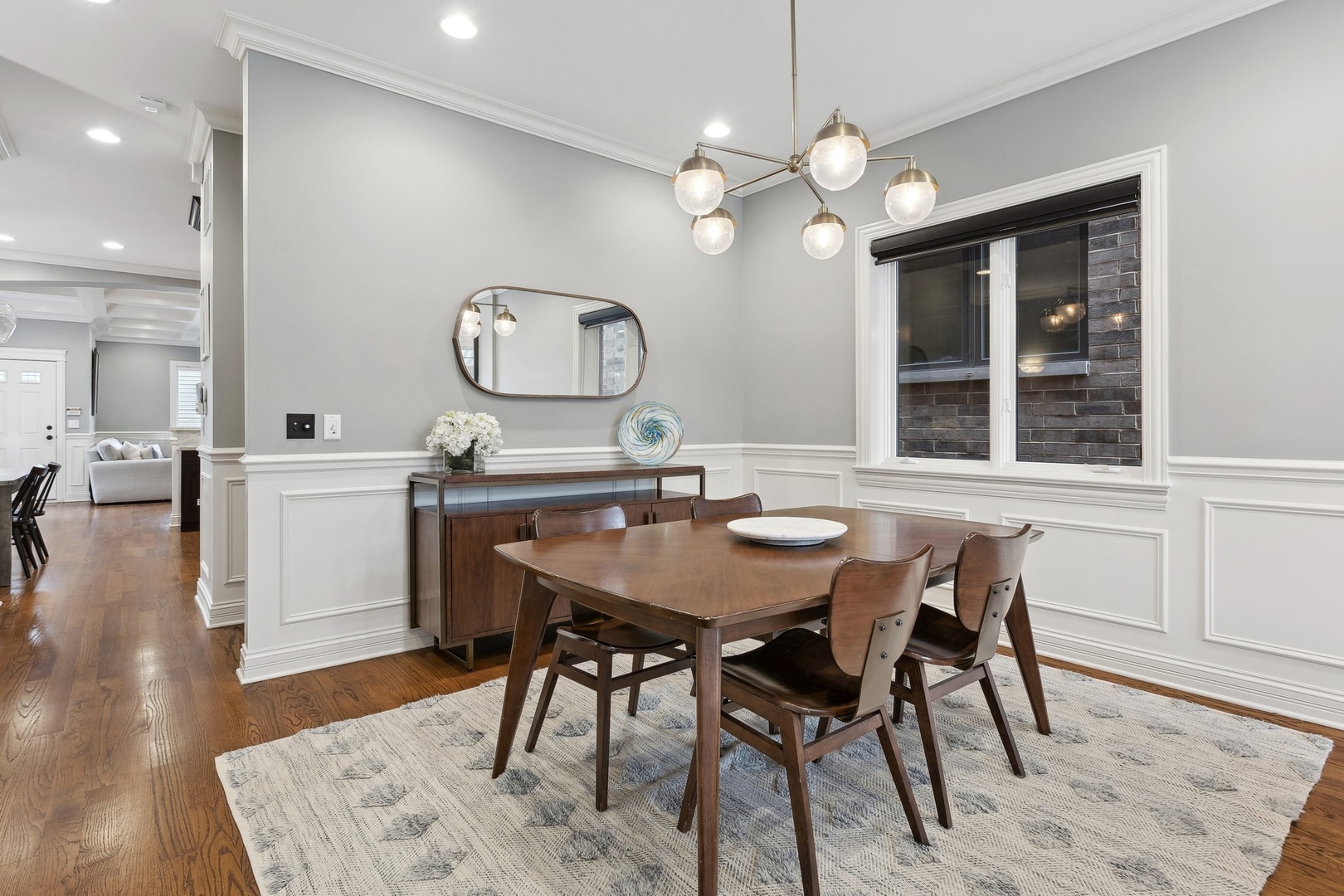 1520 West Diversey Parkway, Unit 1 Chicago, IL 60614 - Photo 4 of 31 a view of a dining room with furniture and wooden floor