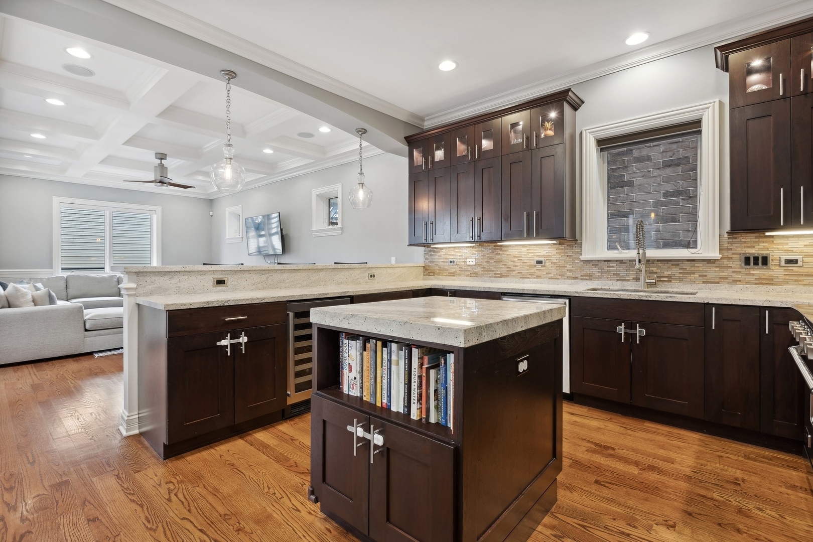 1520 West Diversey Parkway, Unit 1 Chicago, IL 60614 - Photo 7 of 31 a kitchen with a sink stove and wooden cabinets