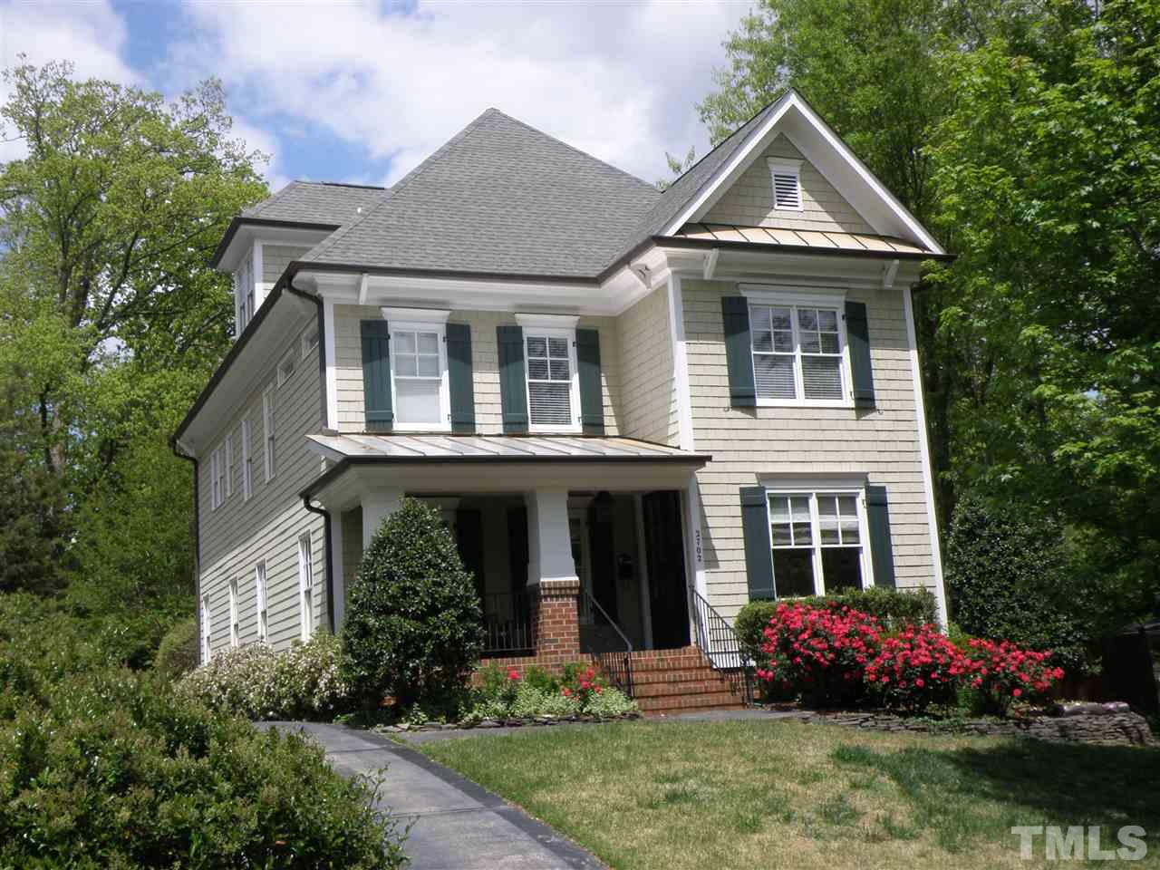 2702 Bedford Avenue Raleigh, NC 27607 - Photo 1 of 25 front view of a house with a yard