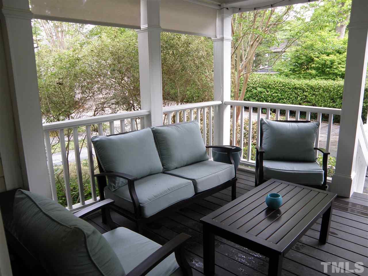 2702 Bedford Avenue Raleigh, NC 27607 - Photo 15 of 25 a balcony view with a couch and a large window