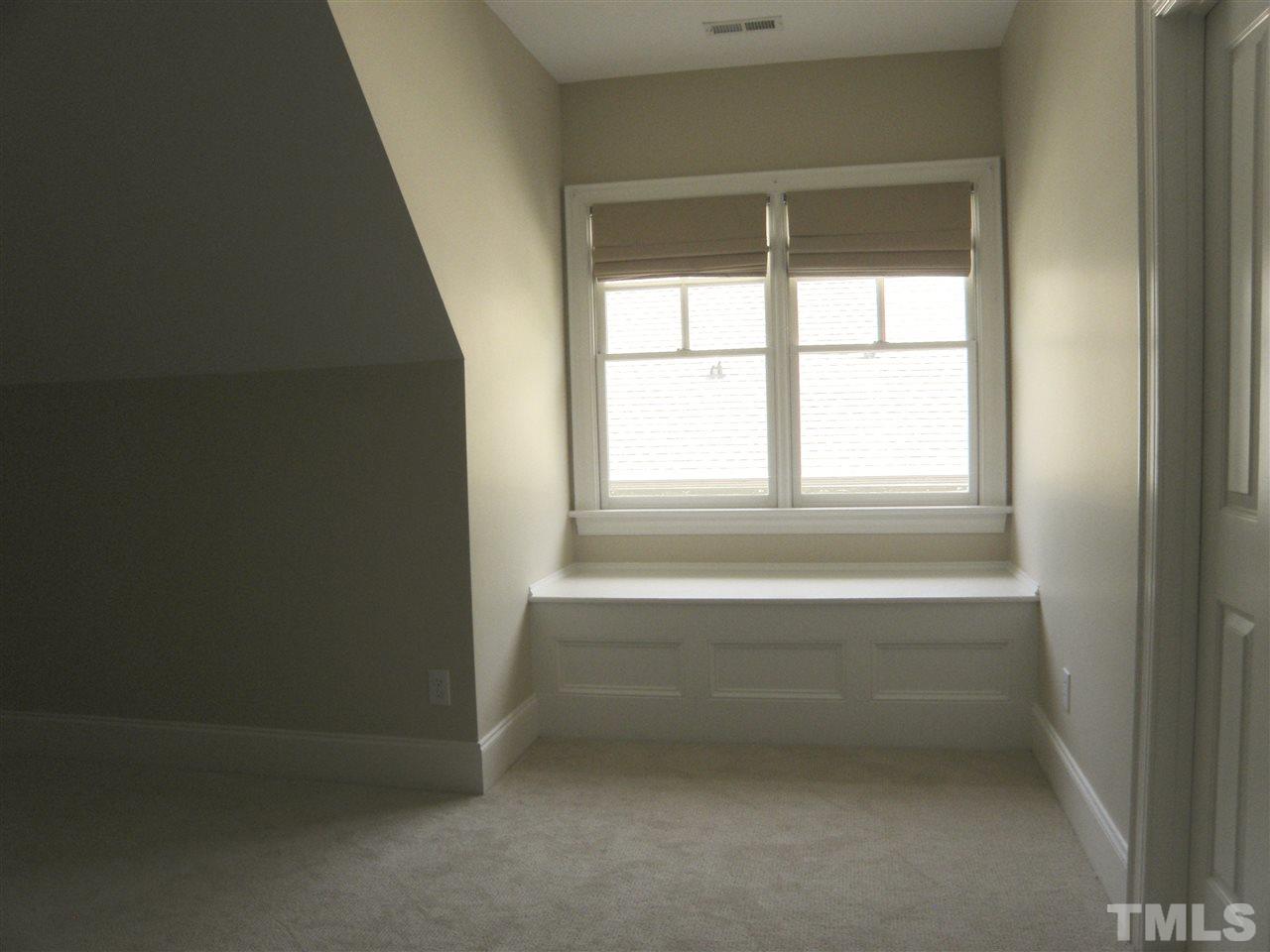2702 Bedford Avenue Raleigh, NC 27607 - Photo 21 of 25 an empty room with a window