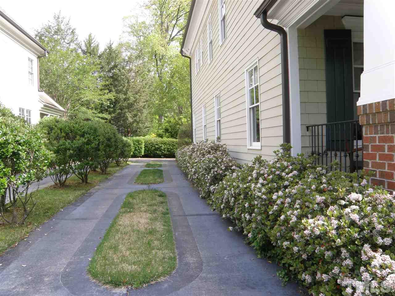 2702 Bedford Avenue Raleigh, NC 27607 - Photo 25 of 25 a view of a backyard with plants