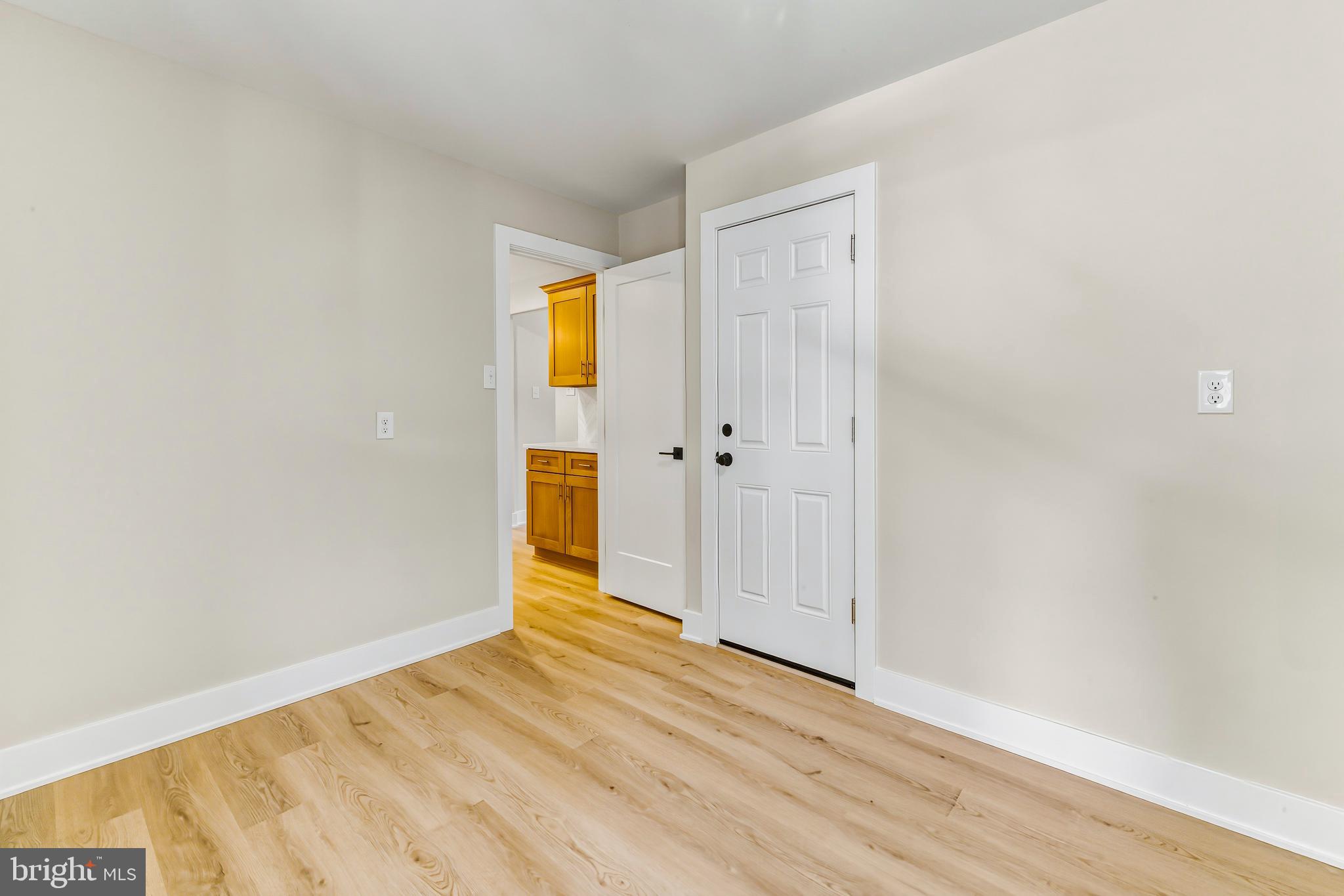 88 Freedom Road Sewell, NJ 08080 - Photo 16 of 30 a view of an empty room with wooden floor