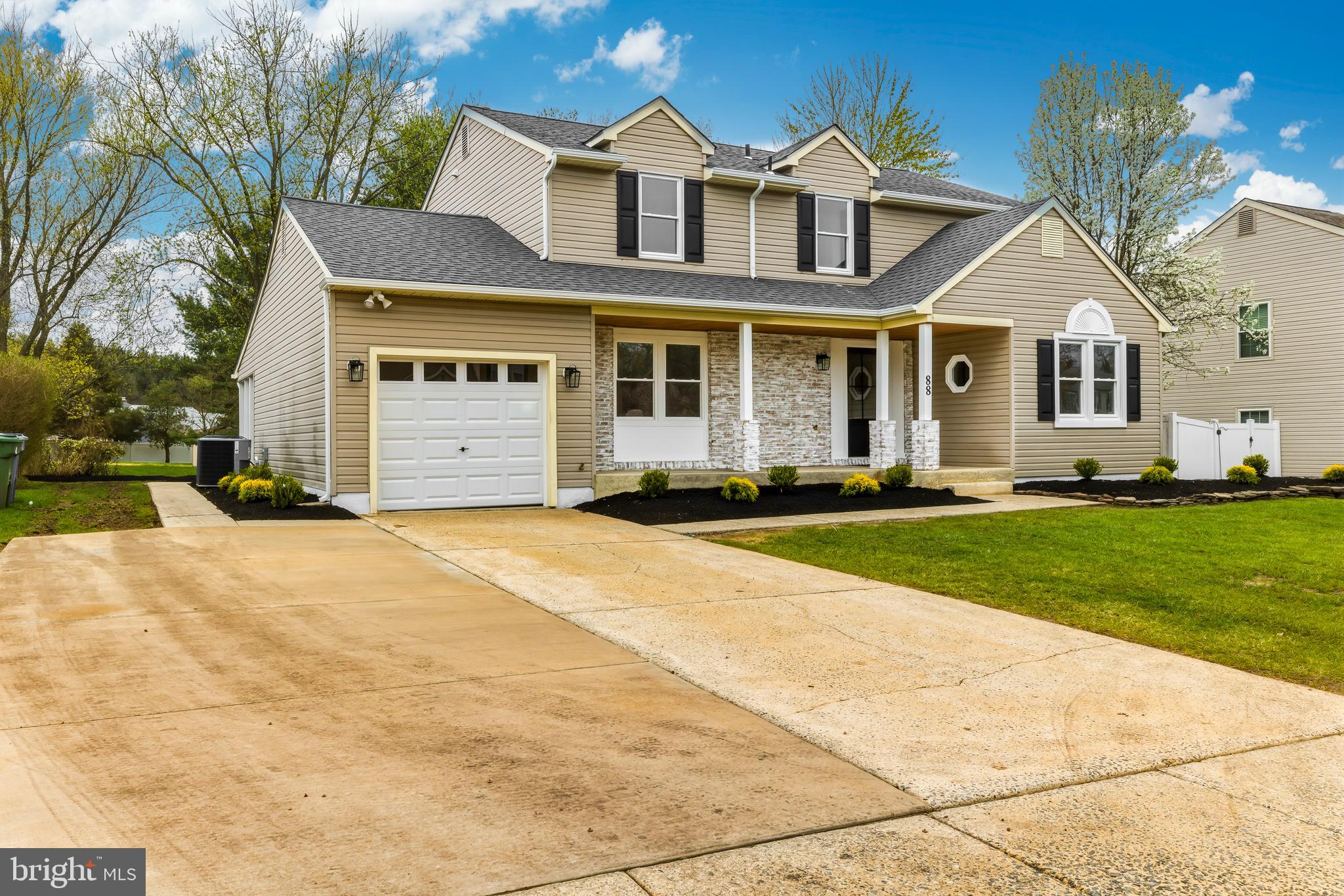 88 Freedom Road Sewell, NJ 08080 - Photo 2 of 30 a front view of a house with a yard