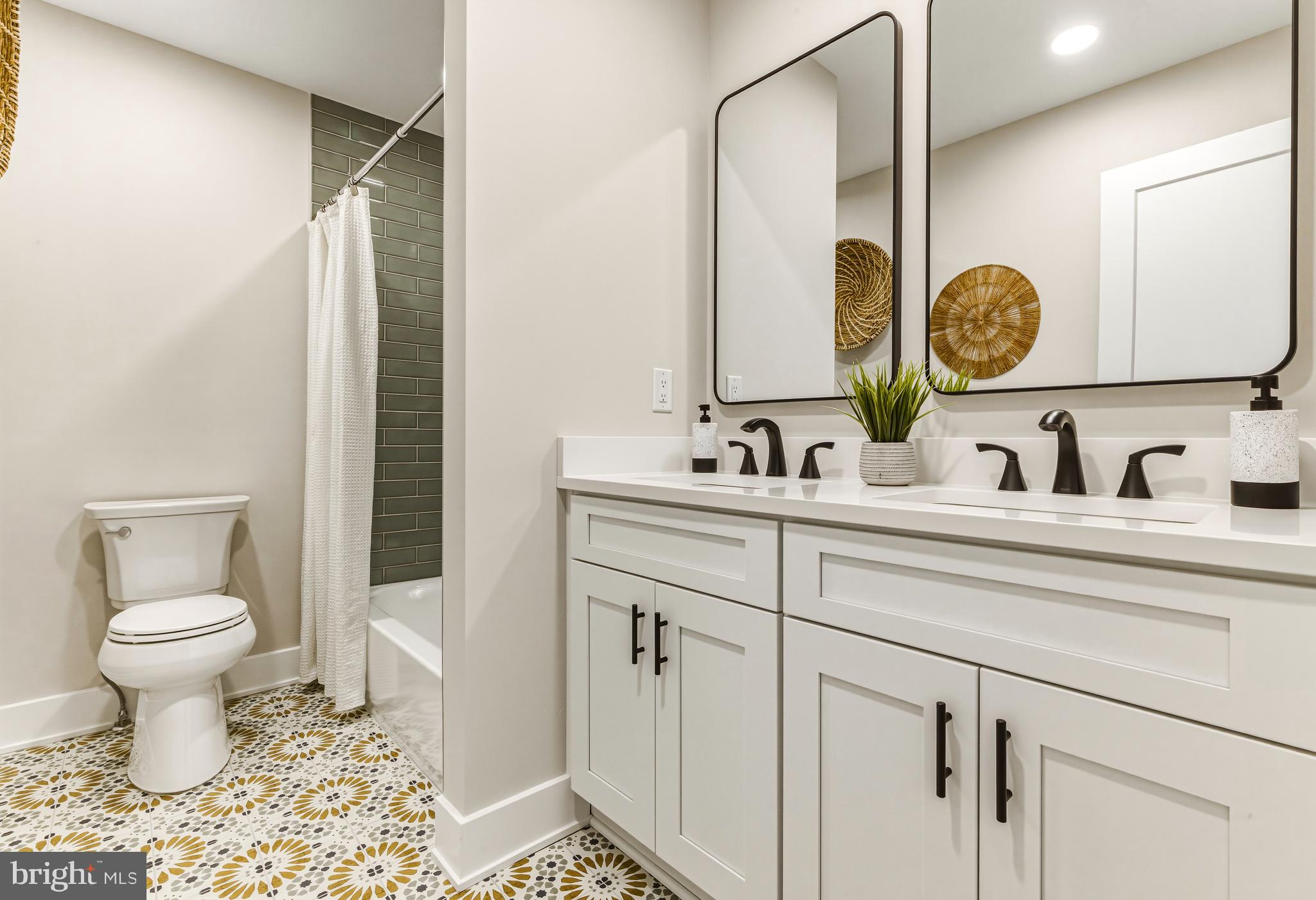 88 Freedom Road Sewell, NJ 08080 - Photo 24 of 30 a bathroom with a toilet sink and mirror
