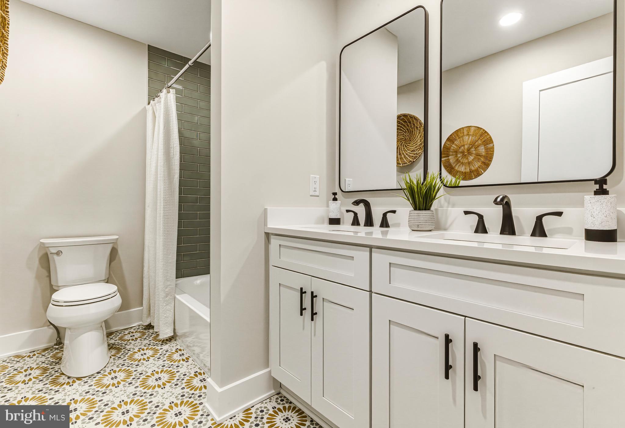 88 Freedom Road Sewell, NJ 08080 - Photo 25 of 30 a bathroom with a toilet sink and mirror