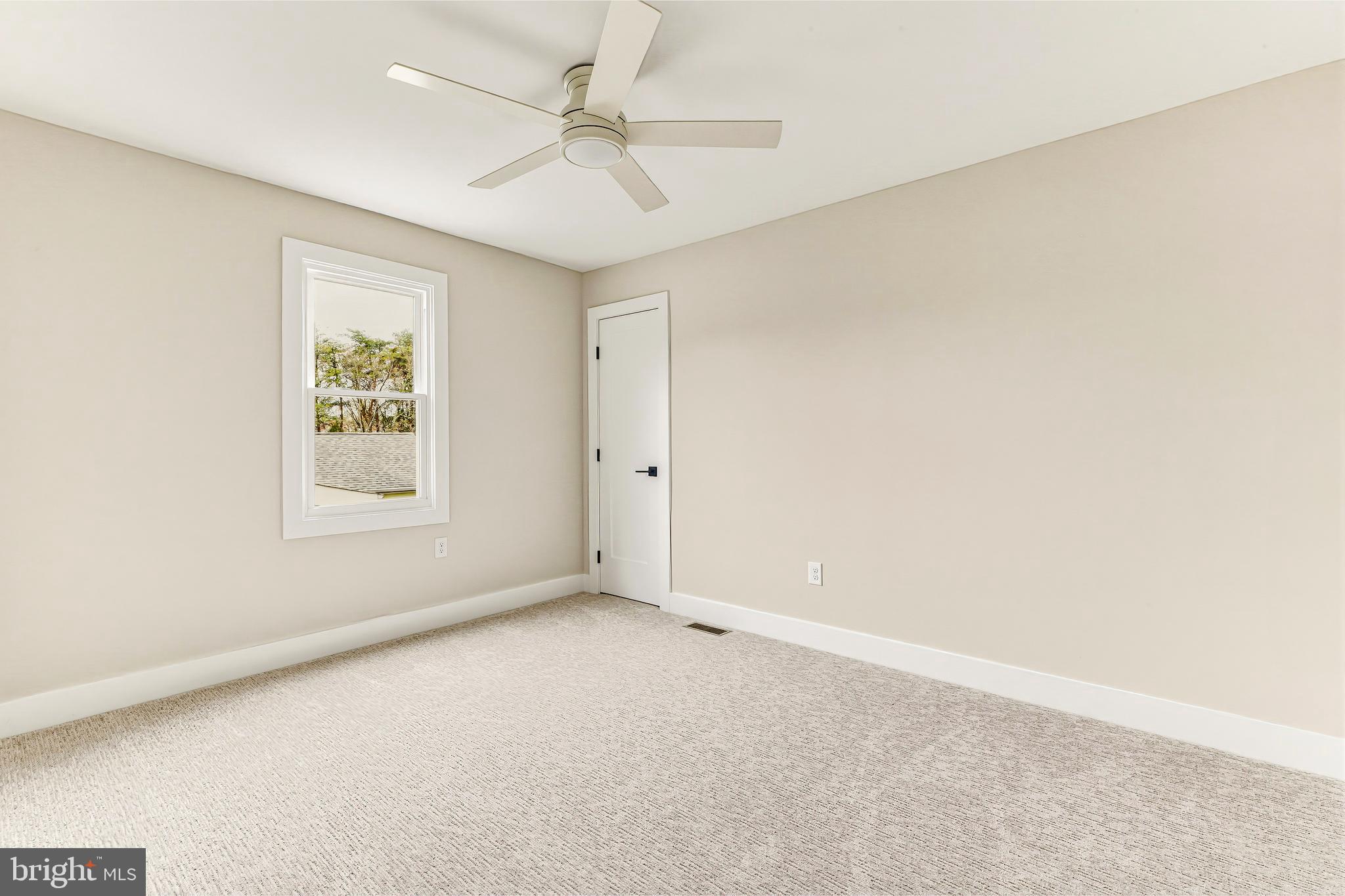 88 Freedom Road Sewell, NJ 08080 - Photo 26 of 30 an empty room with windows and fan