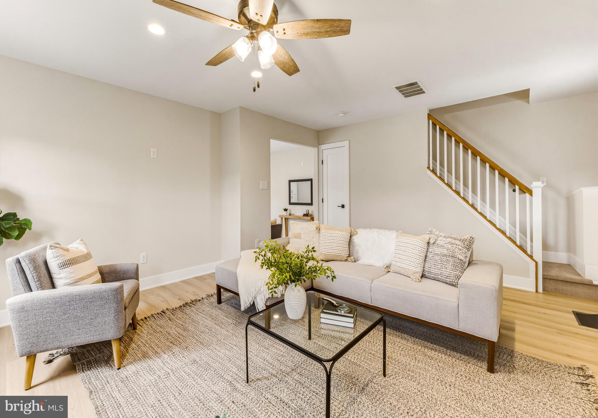 88 Freedom Road Sewell, NJ 08080 - Photo 3 of 30 a living room with furniture and a chandelier