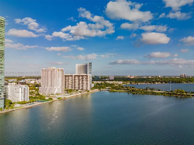 a view of a city with tall buildings