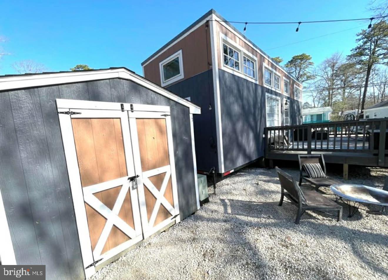 561 Corsons Tavern Road, Unit 43 Ocean View, NJ 08230 - Photo 6 of 18 a front view of a house with wooden fence