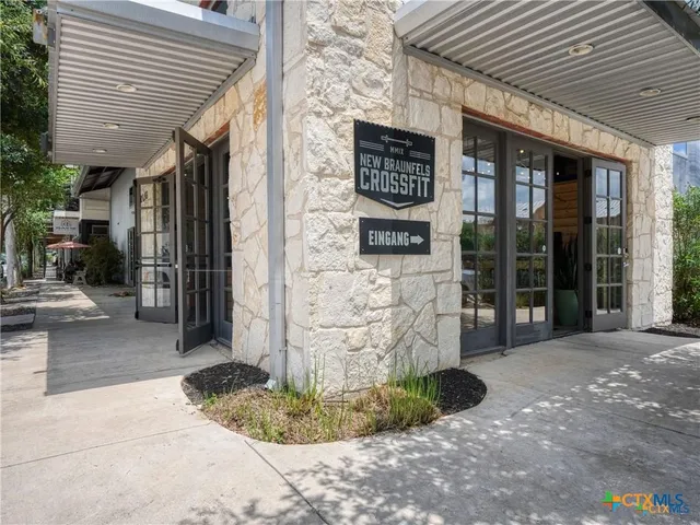 an aerial view of a city with lots of residential buildings