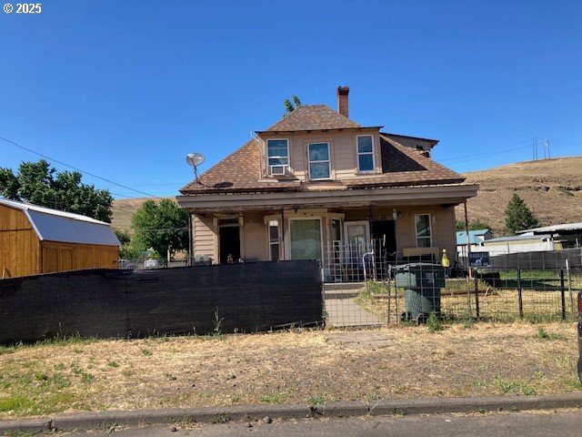 1103 Southeast Alexander Place Pendleton, OR 97801 - Photo 1 of 1 a front view of a house with a yard