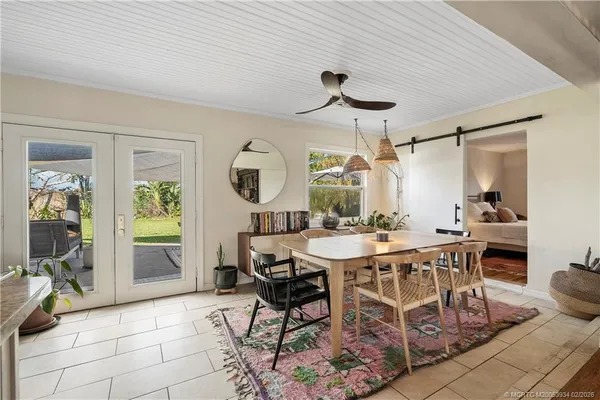 a kitchen with stainless steel appliances a stove a sink a refrigerator and cabinets